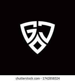 GJ monogram logo with modern shield style design template isolated on black background