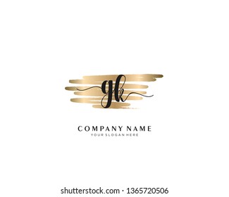 GK initial handwriting logo with brush gold color template vector