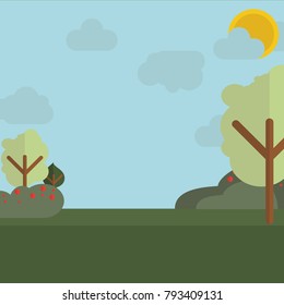 Glade surrounded by trees and bushes with berries