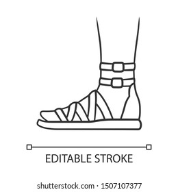 Gladiator sandals linear icon.. Woman stylish footwear design. Female casual shoes, modern summer flats. Editable stroke. Thin line illustration. Contour symbol. Vector isolated outline drawing