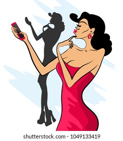 Glamorous lady in red dress and red shoes makes selfie on her phone