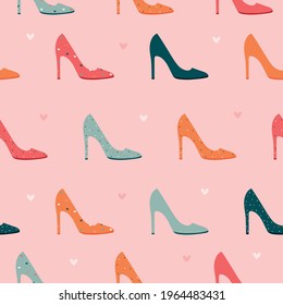 Glamorous seamless pattern on a pink background with shoes