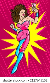 A Glamorous Superwoman Takes A Selfie With Her Phone. Pop-art Style, Vector Illustration. 