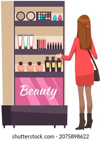 Glamour cosmetics make up on shelf, powder, foundation, perfume,sunblock,lipstick. Girl chooses cosmetics in closet with face skin care products. Woman looking at make-up products on shelves