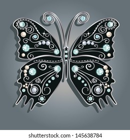 Glamour vector vintage silver butterfly with elegance ornament encrusted with blue jewels on gray background. with shadow