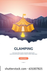 Glamping. Glamor camping. Campfire. Pine forest and rocky mountains. Evening Camp
