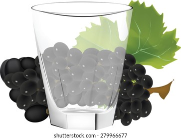 glass beaker with bunch of grapes