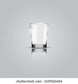 Glass beaker with reflection on gray background