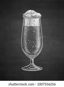 Glass of beer. Chalk sketch on blackboard background. Hand drawn vector illustration. Retro style.