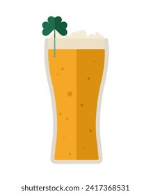 Glass of beer with clover on white background. St. Patrick's Day