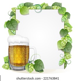 Glass of beer with foam cap and white background decorated with green hops branch. Abstract Oktoberfest background