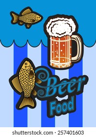glass of beer with foam and fish