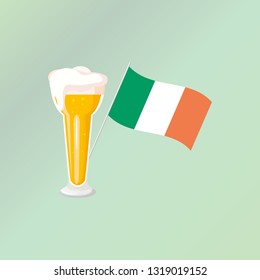 A glass of beer and an Irish flag.