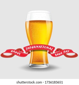 Glass of beer isolated on white background with ribbon international beer day