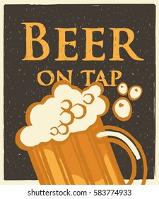 Glass of beer on tap with foam