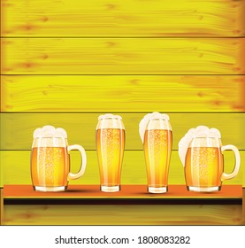 glass of beer on wooden background