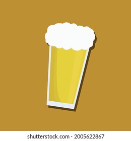 glass of beer on yellow background
