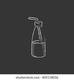 Glass bottle with drinking straw. Drawn in chalk icon.