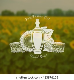 Glass bottle of sunflower oil with field and flower in the center of blurred background