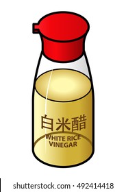 A glass bottle of white rice vinegar.
