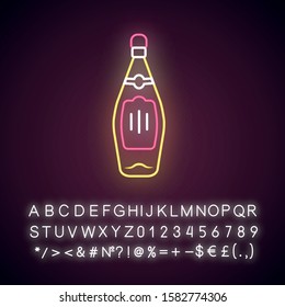 Glass bottle of wine, whiskey, rum neon light icon. Alcoholic drink, beverage. Color liquor bottle with yellow label. Glowing sign with alphabet, numbers and symbols. Vector isolated illustration