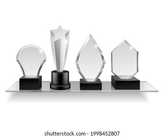 Glass champion prizes on shelf. Realistic different award on shelving, winner trophy shiny acrylic awards various forms, blank competition cup, sport and music achieve vector set