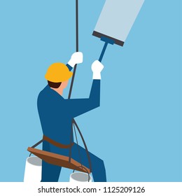 glass cleaner worker of steeplejack washing a skyscraper windows