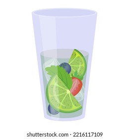 A glass with a cocktail. Drink in a glass with lemon, mint and berries
