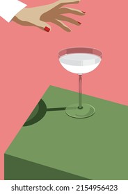 Glass of cocktail witn pink background.
