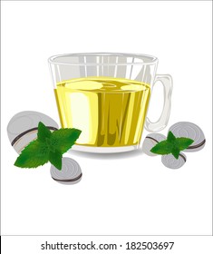 Glass cup of tea with mint leaves