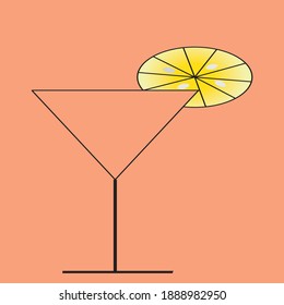 a glass of drink with lemon