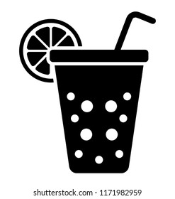 
A glass of fizzy drink with a straw in it
