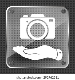 Glass flat hand shows the photo camera icon on a metallic background