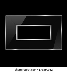 glass frame with silver trim on a black background