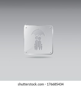 Glass framework with family under an umbrella