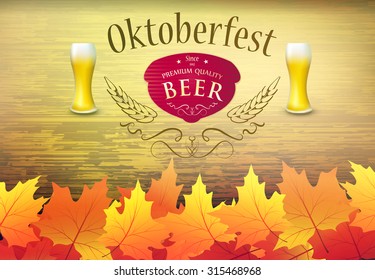 glass of fresh beer Festivities Oktoberfest wooden background with yellow leaves