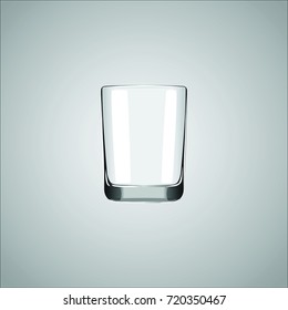 Glass with a glare on the gray background