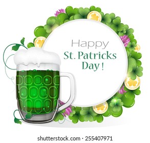 Glass of green beer and gold coins on clover background with round place for text.   St. Patrick's Day background.
