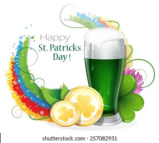 Glass of green beer and gold coins on rainbow background with round place for text.  St. Patrick's Day background.