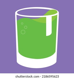 Glass With Green Liquid On Purple Background