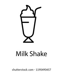 Glass having straw and fruit juice is milkshake 