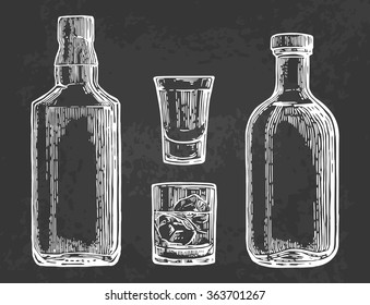 Glass with ice cubes and whiskey, bottle. Engraving vintage vector white illustration. Isolated on black background. Hand drawn design element for label and poster
