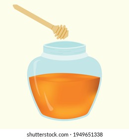 glass jar with  fresh honey inside orange color and with a special spoon for honey
