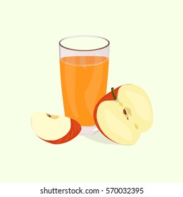 a glass of juice and apples