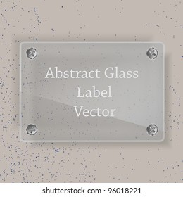 Glass label on the concrete wall