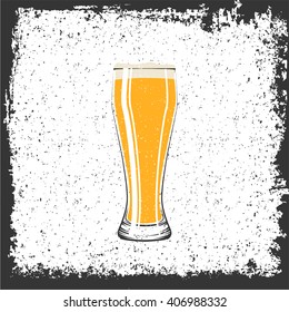 Glass of Lager Beer on grunge background