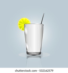 the glass with lemonade and lemon.