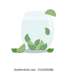 a glass with a light mint drink and a slice of lime