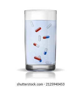 Un vaso de líquido en una mesa reflectante con pastillas flotando dentro 