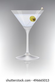 The glass of martini with olive
